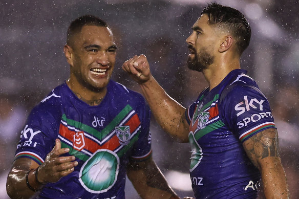 Shaun Johnson (right) and Marata Niukore celebrate his clutch penalty goal before fulltime against Cronulla.