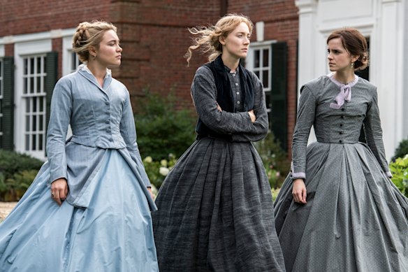 Florence Pugh as Amy, Saoirse Ronan as Jo and Emma Watson as Meg in Greta Gerwig’s Little Women.