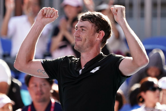 John Millman celebrates after winning his match against Reilly Opelka of the United States. 
