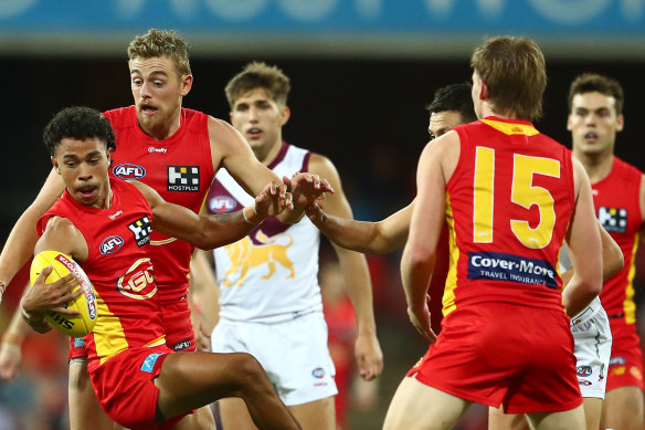 Malcolm Rosas of the Suns in action during the round 9 AFL match between the Gold Coast Suns and the Brisbane Lions at Metricon Stadium on May 15.
