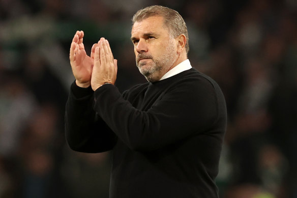 Postecoglou applauds the fans at Celtic Park following a 3-0 defeat by Real Madrid.