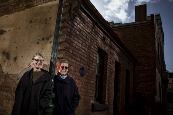Sarah Hayes, left, and Barbara Minchinton outside Little Lon Gin, one of the few remaining vestiges of the former red light district of Little Lon.