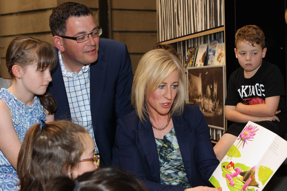 Daniel Andrews, as state opposition leader in 2014, watches his wife, Catherine, reading to children at the State Library. Where might he start reading now that he’s resigned as premier? 