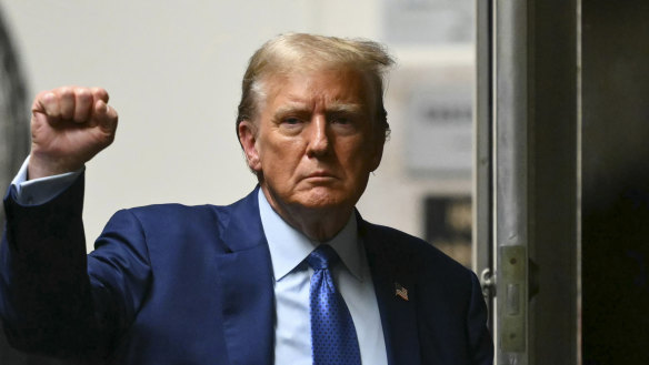 Former president Donald Trump walks to the courtroom following a break in his trial at Manhattan criminal court on May 9.