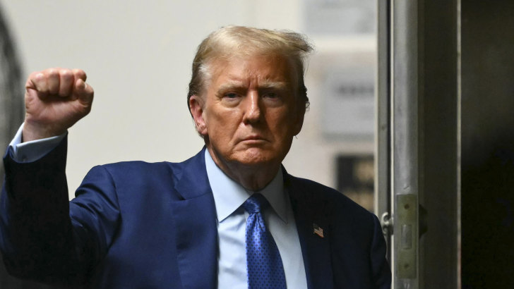 Former president Donald Trump walks to the courtroom following a break in his trial at Manhattan criminal court on May 9.