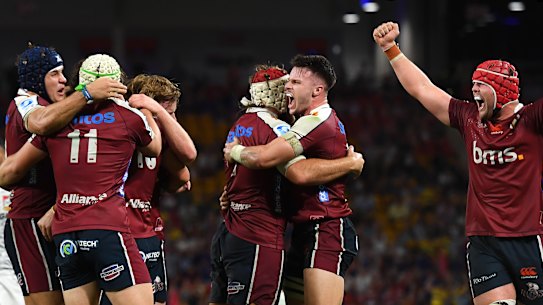 Queensland Reds celebrate victory.
