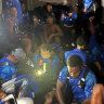 Fijian Drua player Inia Tabuavou on the attack against the Hurricanes. Drua players (inset) in the luggage truck.