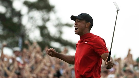 Masterful: Tiger Woods reacts to claiming his 15th major after his win at Augusta.