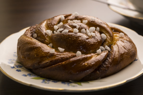 A cinnamon-and-cardamom bun with pearl sugar.