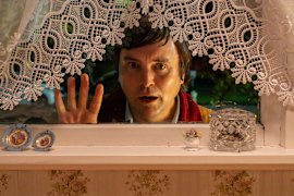 New Zealand comedian Tom Sainsbury is the creator and star of true-crime parody series Small Town Scandal.