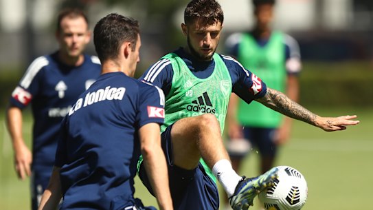Jake Brimmer controls the ball during a Victory training session.