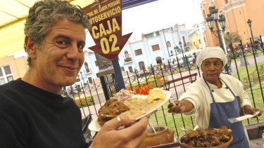 Anthony Bourdain in the Plaza Italia in the Peruvian capital, Lima, filming his series <i>No Reservations</i>.