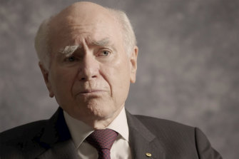 John Howard says he backed his then-tourism minister.