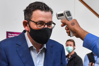 Premier Daniel Andrews prepares for his announcement at the Doherty Institute on Friday.