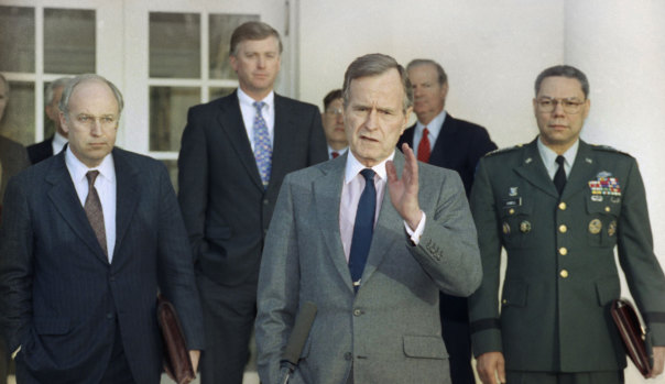 President George H.W. Bush talks to reporters in the Rose Garden of the White House in 1991. He is surrounded by then (from left) defence secretary Dick Cheney, vice-president Dan Quayle, White House chief of staff John Sununu, secretary of sState James Baker, and joint chiefs chairman General Colin Powell. 