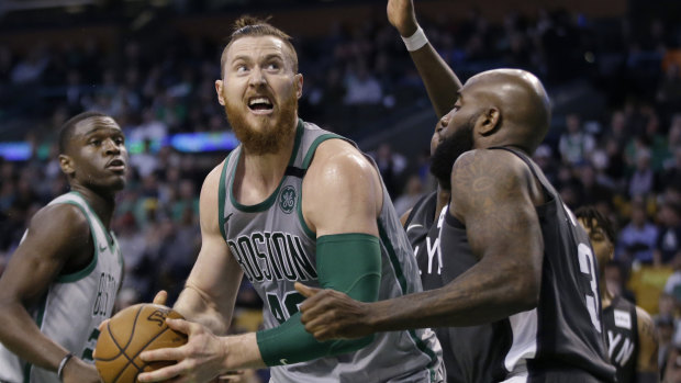 Aron Baynes is happy to be staying with the Celtics.