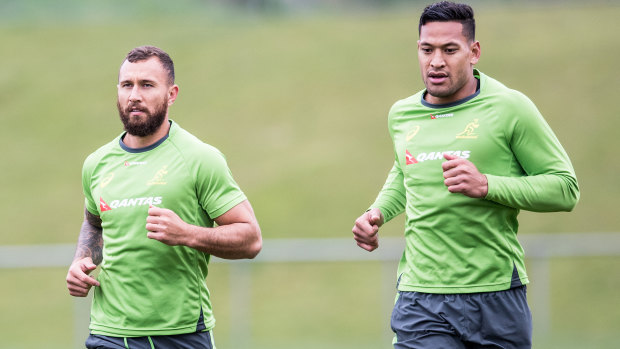 Quade Cooper and Israel Folau train together during their time with the Wallabies.
