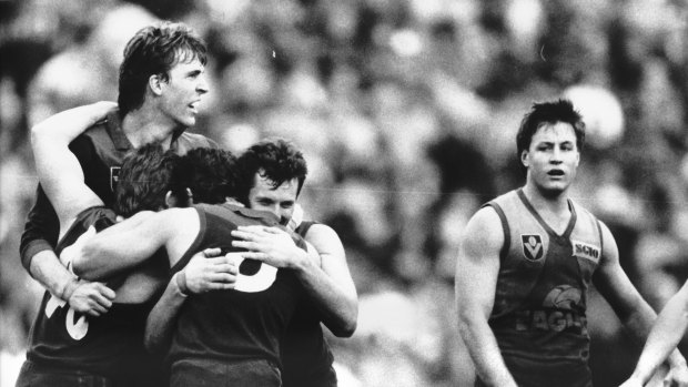 Melbourne players celebrate after defeating the Eagles in the 1988 elimination final.