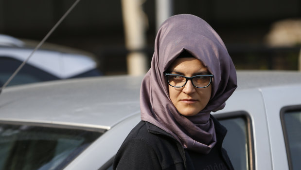 A woman who identified herself as Hatice A., the Turkish fiancee of Saudi journalist Jamal Khashoggi, walks outside the Saudi Arabia consulate in Istanbul, on Wednesday, October 3.