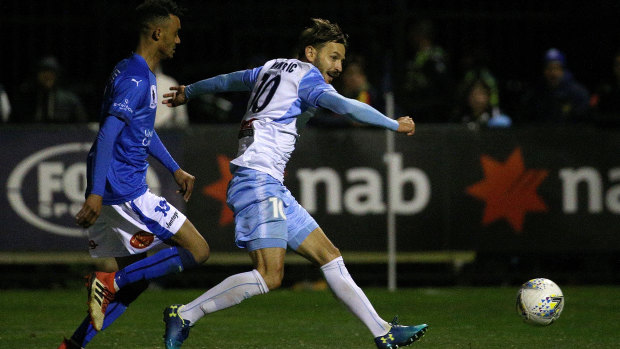 Sanity prevails: Milos Ninkovic puts his name on the score sheet as Sydney FC are pushed to the limit.