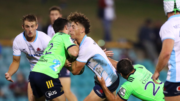 Mark Nawaqanitawase in action for the Waratahs on Friday evening at Leichhardt Oval. 