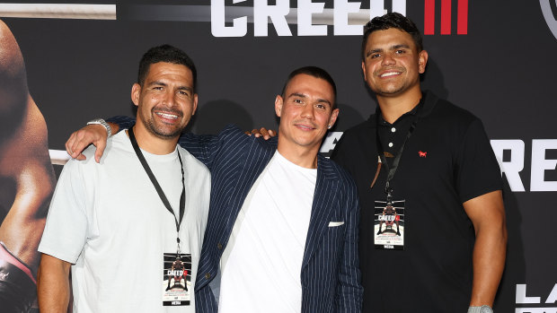 Tim Tszyu with Rabbitohs stars Cody Walker and Latrell Mitchell.