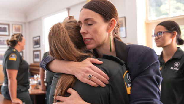New Zealand PM Jacinda Ardern meets first responders after the volcano eruption.