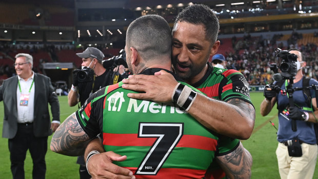 Benji Marshall and Adam Reynolds embrace after securing their plave in the grand final.