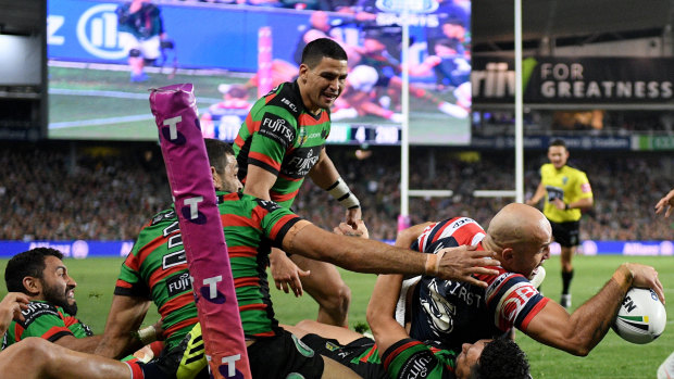 Hunger games: Blake Ferguson reaches out to plunge a dagger into Rabbitohs' hearts.