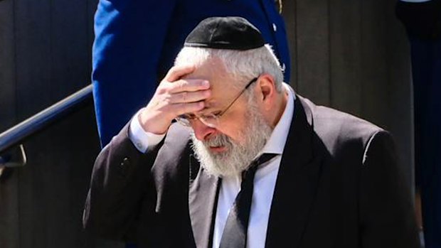 A coffin containing the body of Rabbi Eli Schlanger arrives at the Chabad of Bondi Synagogue during his funeral on December 17, 2025 in Sydney, Australia. 