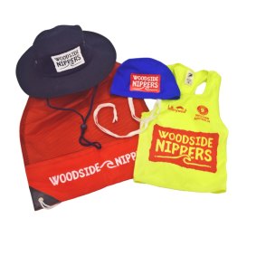 Every junior lifesaver in WA gets a free uniform with Woodside’s logo.