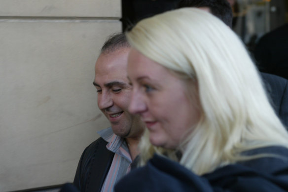 Nicola Gobbo with Tony Mokbel outside court in 2004.