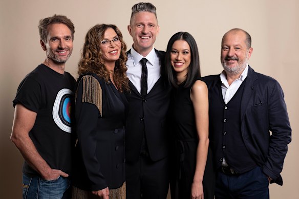Wil Anderson (centre) with Gruen presenters Todd Sampson, Dee Madigan, Karen Ferry and Russel Howcroft.