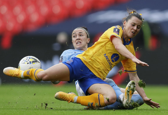 Everton's Hayley Raso is cut down by Lucy Bronze of Manchester City at Wembley.