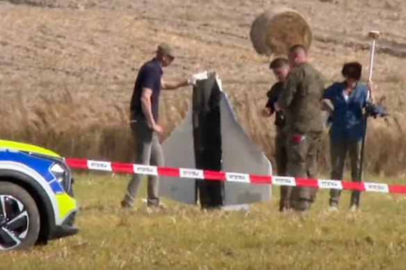 Polish police secure parts of a damaged object shot down by Polish authorities in Wohyn on Wednesday.