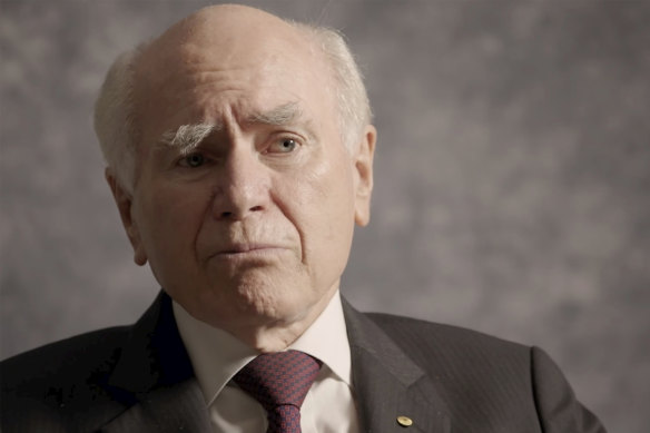 John Howard says he backed his then-tourism minister.