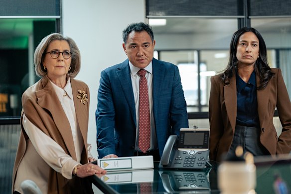 Marg Downey, who plays club president Catherine La Fontaine, Sam Pang as administrator Hugh Shen and Emma Harvie as executive Destiny Pitt in Ground Up. 