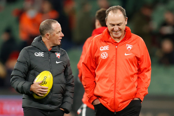 Don Pyke and John Longmire have every reason to smile given the Swans’ blessed run with injury.