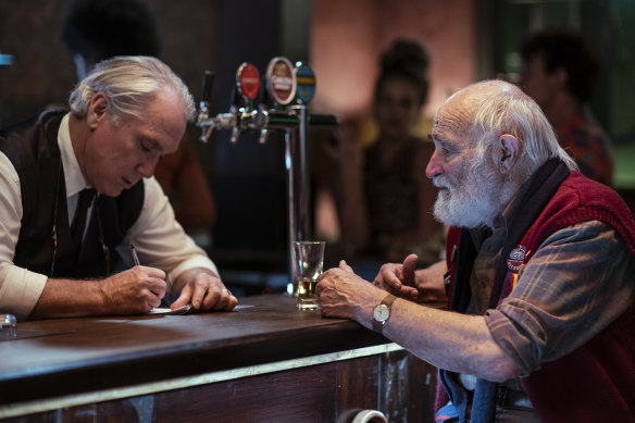 Stan (Damien Garvey) and Wilbur (John Flaus) in the newly renovated Prince of Prussia pub in the third season of <i>Jack Irish</i>.