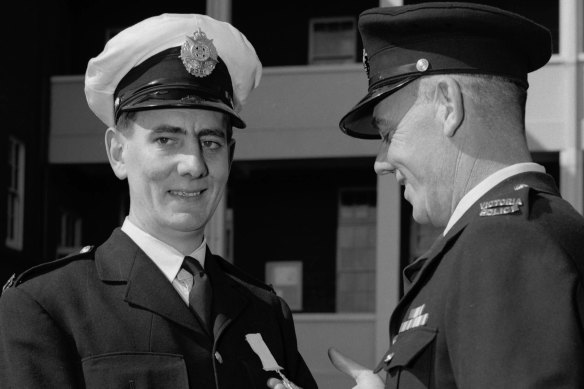 Daryl Payne, with his father George, receives the Valour Award.