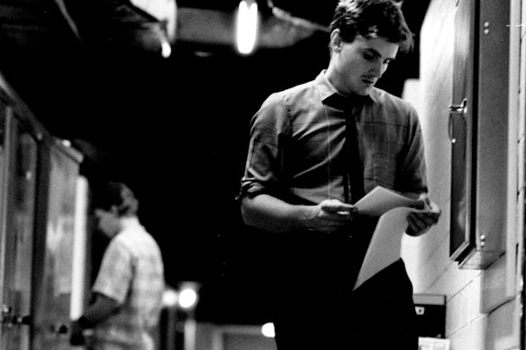 Glover in 1985 working on a story for the Herald.