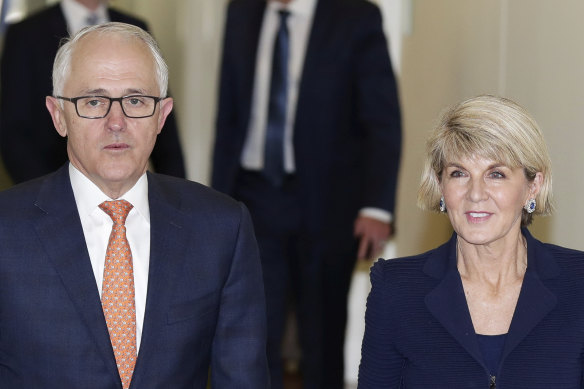 Former prime minister Malcolm Turnbull and former foreign minister Julie Bishop exit the party room after the second Liberal leadership spill of 2018.