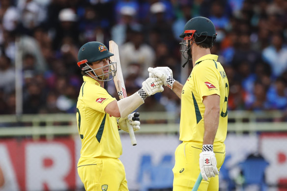 Easy does it: Travis Head and Mitchell Marsh polish off the 118 runs.