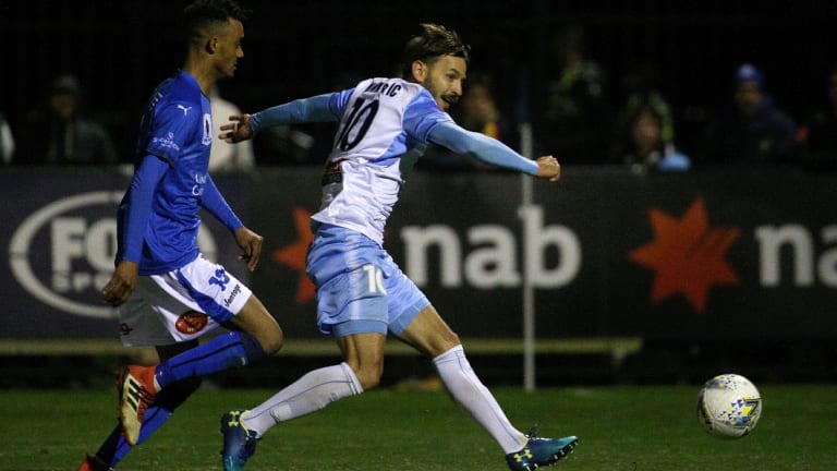 Sanity prevails: Milos Ninkovic puts his name on the score sheet as Sydney FC are pushed to the limit.