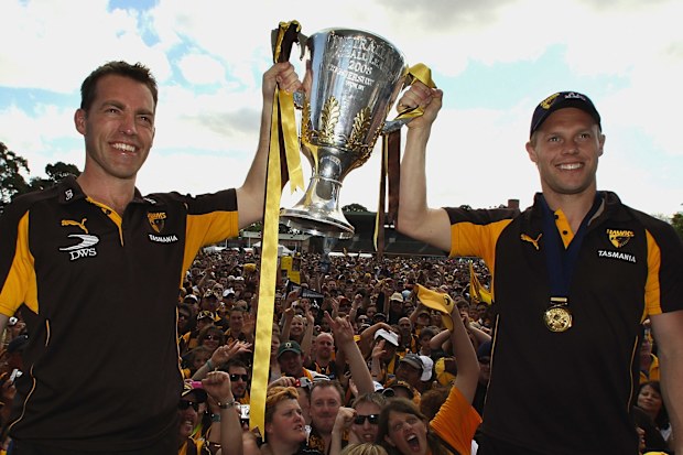 MELBOURNE, AUSTRALIA - SEPTEMBER 28:  Alastair Clarkson coach of the Hawks and Sam Mitchell the captain hold up the 2008 AFL Premiership Cup during the Hawthorn Hawks AFL Grand Final reception at Ausdoc Oval on September 28, 2008 in Melbourne, Australia.  (Photo by Mark Dadswell/Getty Images)