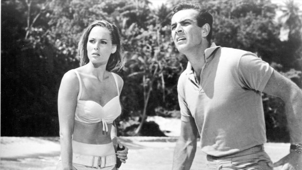 The iconic Bond: Sean Connery with Ursula Andress in a scene from Dr No (1962).