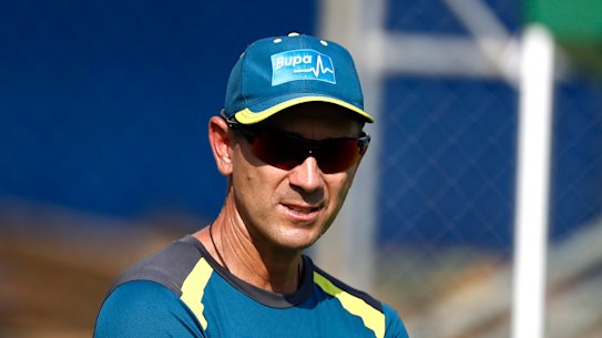 Justin Langer (right) with skipper Tim Paine.