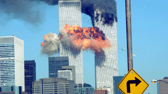 A fiery blasts rocks the World Trade Centre after being hit by two planes on September 11, 2001.