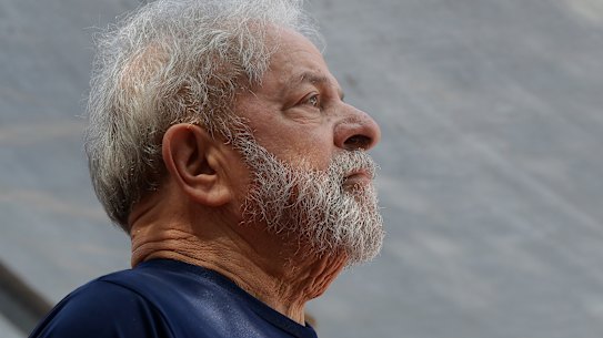 Former Brazilian President Luis Inacio Lula da Silva looks on before speaking to supporters before being jailed last year.