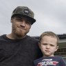Matthew Wood with his son at home in Sydney.